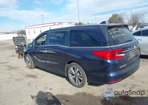 2022 Honda Odyssey Touring z USA, uszkodzony, nr VIN 5FNRL6H8XNB057584